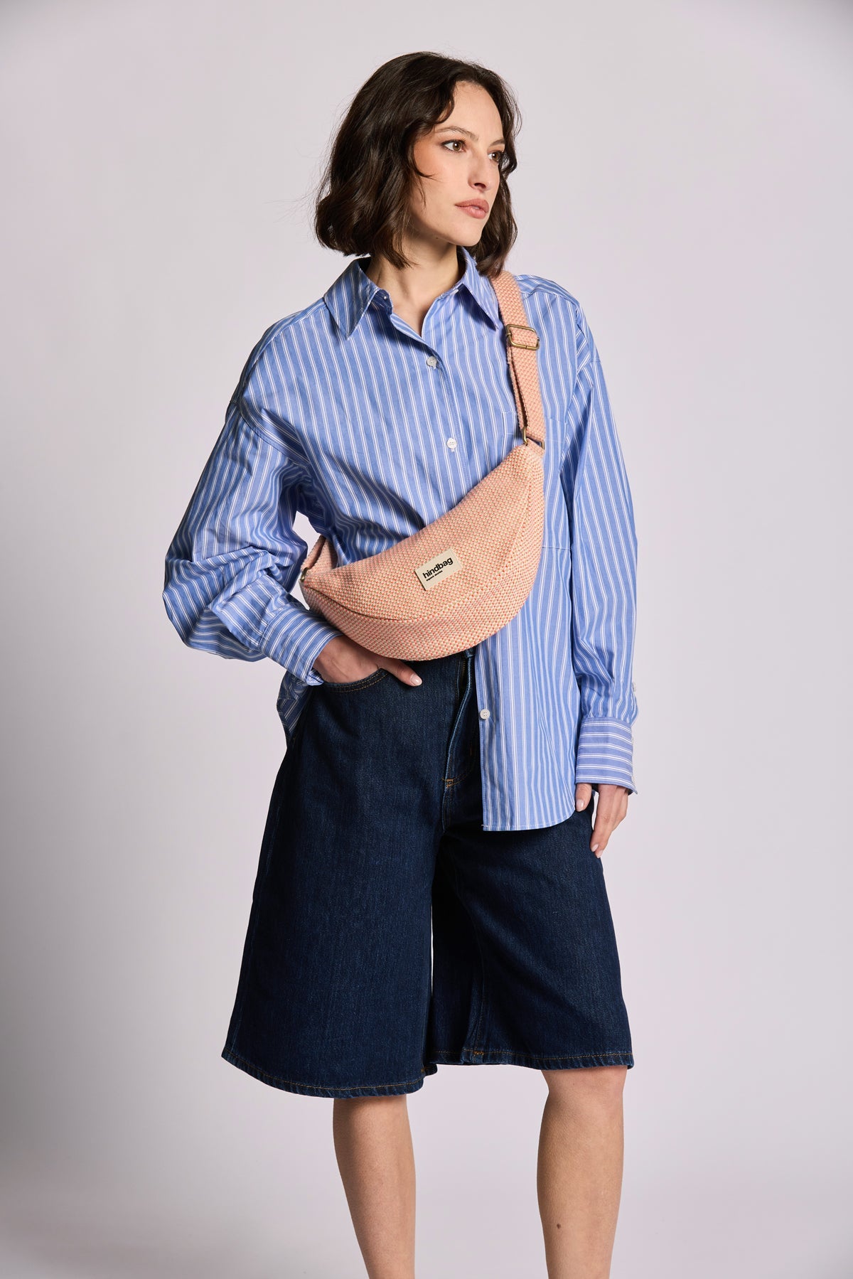 Andrea Woven bum bag in Coral
