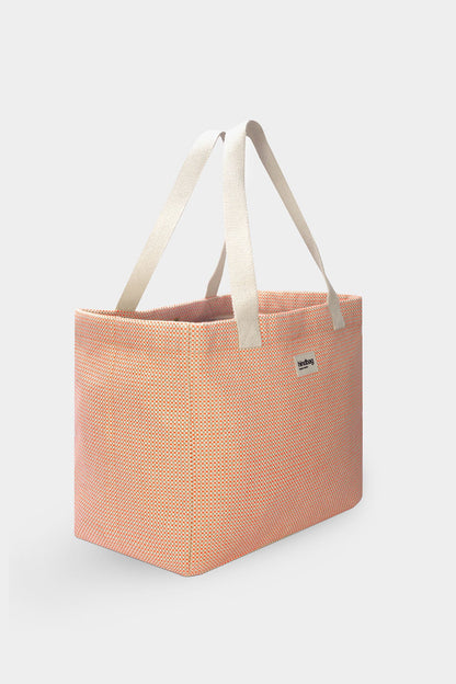 Claude coral woven tote bag