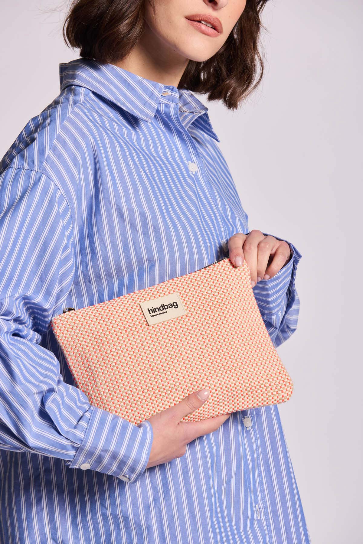 Ema coral woven pouch